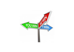 sign pointing multiple ways saying we win