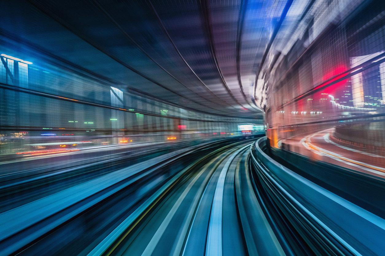 Blurred tunnel with vibrant colors and lights