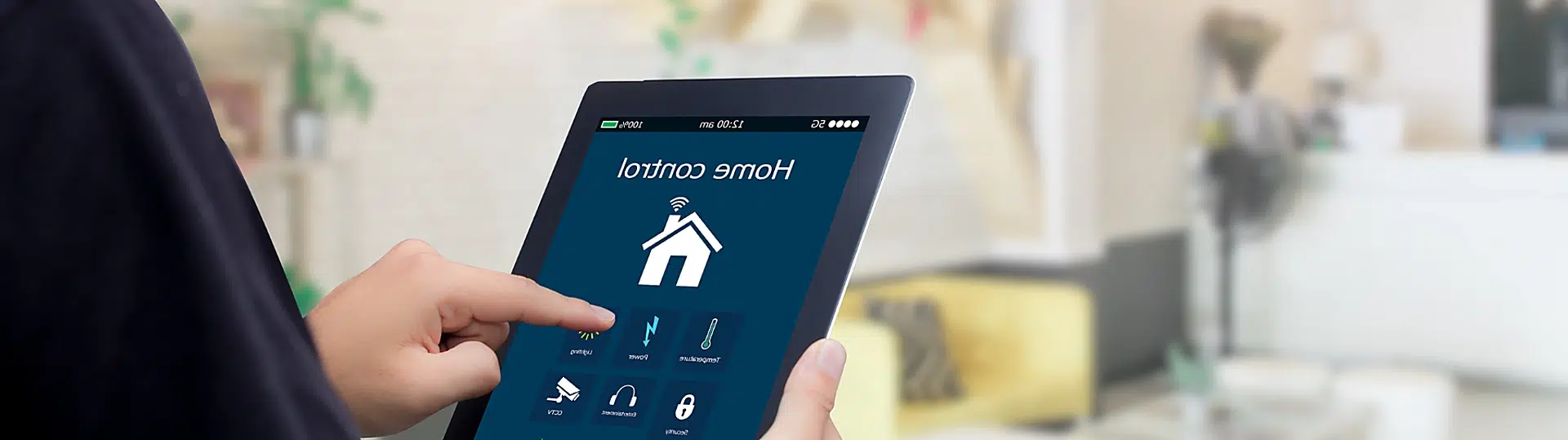 Consumer using smart home IoT control application demonstrating connected device security measures