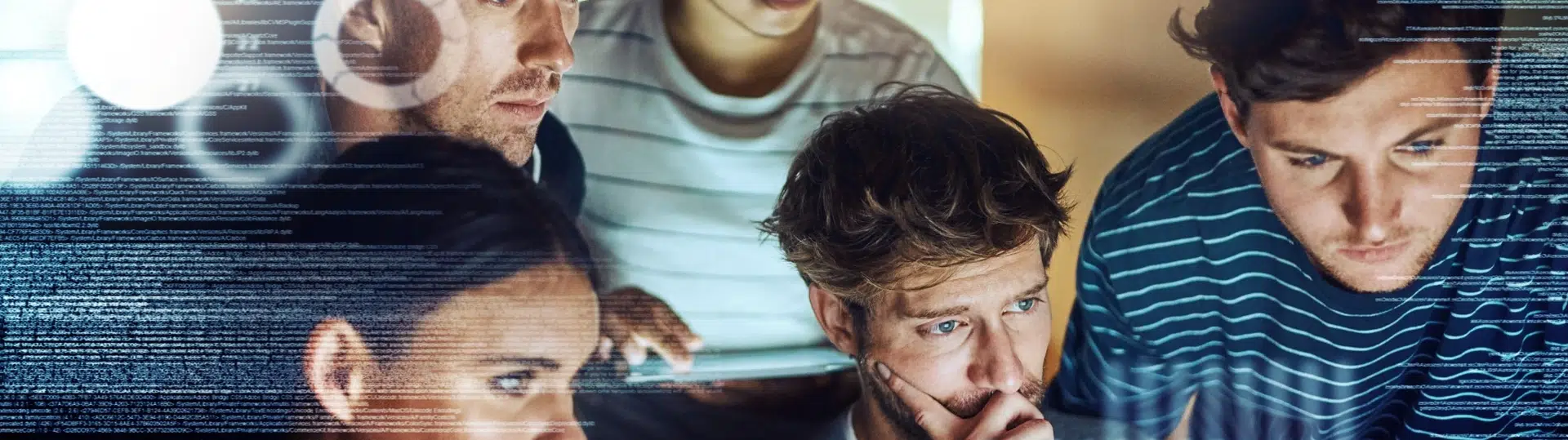 Technology professionals collaborating on code and digital systems