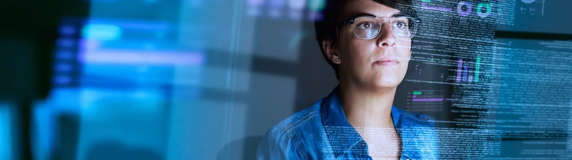 Female Latin American engineer studying AI data visualization overlays demonstrating deep technical expertise